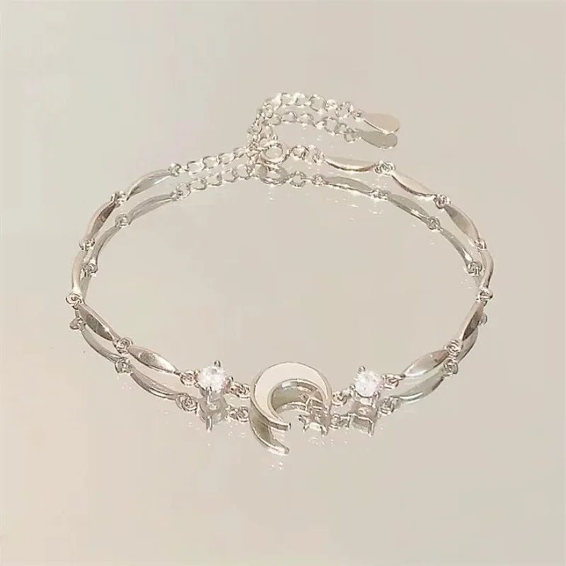 Side view of seasonal charm bracelets showing polished finish and adjustable fit.