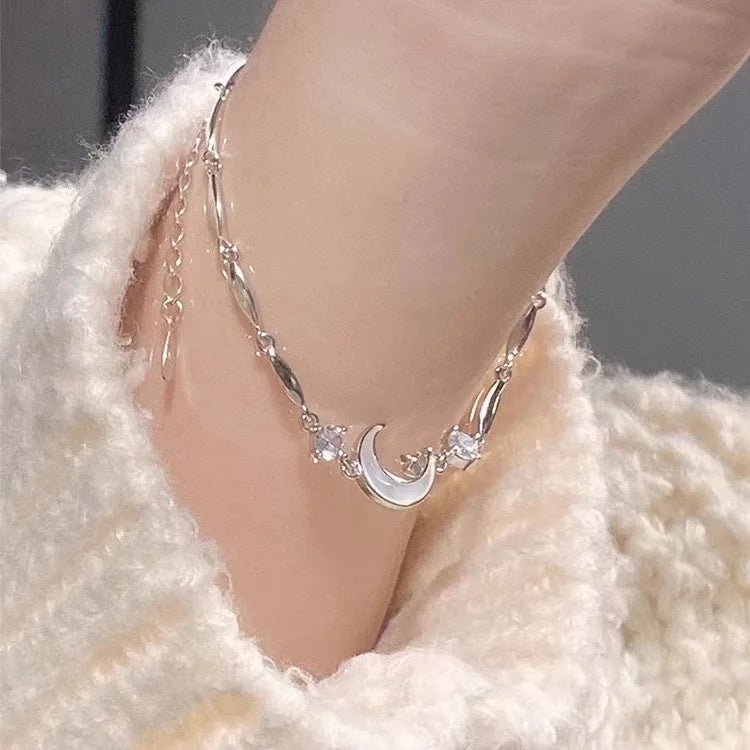 Flat lay of four-piece bracelet set by Klerona & Co, showcasing seasonal charm variety.