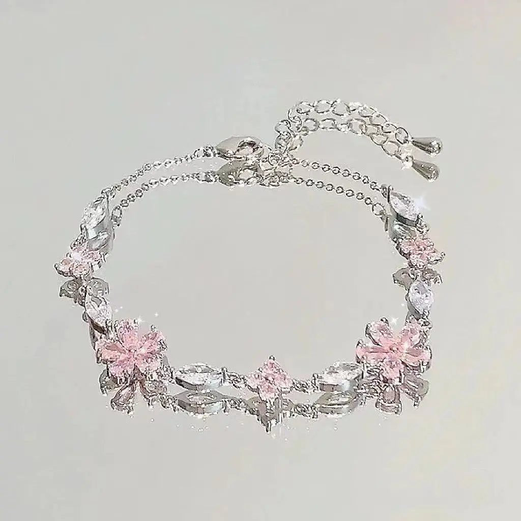 Klerona & Co dainty seasonal bracelet set featuring four unique charm styles in gold finish.