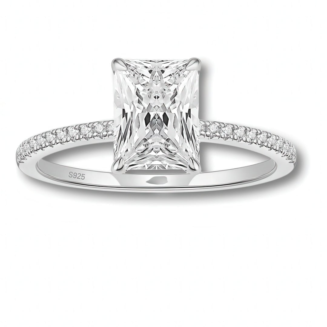 Close-up of sterling silver ring with 3-carat oval-cut cubic zirconia in solitaire setting.